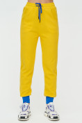 Оптом Спортивные брюки женские желтого цвета 1307J в Казани, фото 7