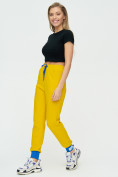 Оптом Спортивные брюки женские желтого цвета 1307J в Казани, фото 4