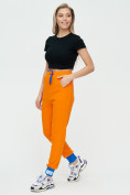 Оптом Спортивные брюки женские оранжевого цвета 1307O в Казани, фото 4