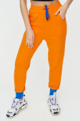 Оптом Спортивные брюки женские оранжевого цвета 1307O в Казани, фото 12