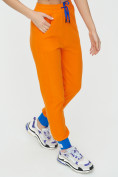 Оптом Спортивные брюки женские оранжевого цвета 1307O в Перми, фото 14