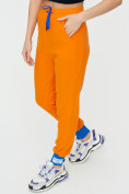 Оптом Спортивные брюки женские оранжевого цвета 1307O в Перми, фото 15