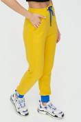Оптом Спортивные брюки женские желтого цвета 1307J в Перми, фото 12