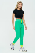 Оптом Спортивные брюки женские зеленого цвета 1307Z, фото 3