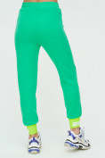 Оптом Спортивные брюки женские зеленого цвета 1307Z, фото 9