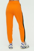 Оптом Штаны джоггеры женские оранжевого цвета 1309O в Перми, фото 10