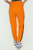 Оптом Штаны джоггеры женские оранжевого цвета 1309O в Перми, фото 13