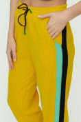Оптом Штаны джоггеры женские желтого цвета 1309J в Перми, фото 15