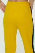 Оптом Штаны джоггеры женские желтого цвета 1309J в Перми, фото 16