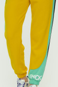 Оптом Штаны джоггеры женские желтого цвета 1309J в Перми, фото 17