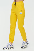 Оптом Штаны джоггеры женские желтого цвета 1312J в Перми, фото 10