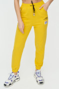Оптом Штаны джоггеры женские желтого цвета 1312J в Перми, фото 12