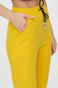 Оптом Штаны джоггеры женские желтого цвета 1312J в Перми, фото 18