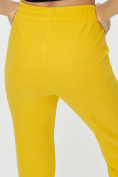 Оптом Штаны джоггеры женские желтого цвета 1312J в Перми, фото 19