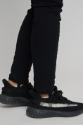 Оптом Cтрейчевые брюки утепленные женские черного цвета 2033Ch в Казани, фото 9