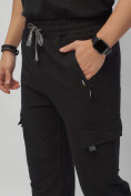 Оптом Брюки джоггеры спортивные с карманами мужские черного цвета 224Ch, фото 11