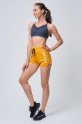 Оптом Спортивные женские шорты желтого цвета 212308J в Перми, фото 4