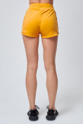 Оптом Спортивные женские шорты желтого цвета 212308J в Екатеринбурге, фото 9