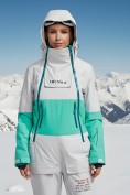Оптом Горнолыжный комбинезон женский зимний зеленого цвета 2320Z