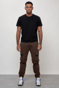 Оптом Джинсы карго мужские с накладными карманами коричневого цвета 2403-1K