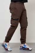 Оптом Джинсы карго мужские с накладными карманами коричневого цвета 2403-1K в Иркутске, фото 7