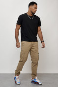 Оптом Джинсы карго мужские с накладными карманами бежевого цвета 2413B в Саратове, фото 11