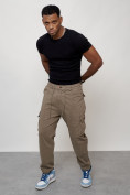 Оптом Джинсы карго мужские с накладными карманами бежевого цвета 2418B в Волгоградке, фото 12