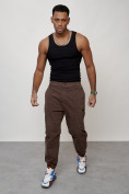 Оптом Джинсы карго мужские с накладными карманами коричневого цвета 2419K в Уфе, фото 10