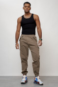 Оптом Джинсы карго мужские с накладными карманами бежевого цвета 2420B в Уфе, фото 10
