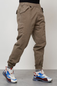 Оптом Джинсы карго мужские с накладными карманами бежевого цвета 2420B в Ярославле, фото 7
