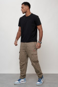 Оптом Джинсы карго мужские с накладными карманами бежевого цвета 2421B в Уфе, фото 10