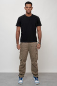 Оптом Джинсы карго мужские с накладными карманами бежевого цвета 2421B в Перми, фото 9