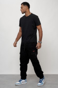 Оптом Джинсы карго мужские с накладными карманами черного цвета 2421Ch в Омске, фото 6