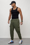 Оптом Джинсы карго мужские с накладными карманами цвета хаки 2422Kh в Сочи, фото 8
