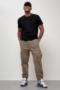 Оптом Джинсы карго мужские с накладными карманами бежевого цвета 2423B в Самаре, фото 4