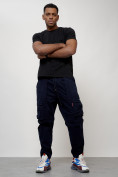 Оптом Джинсы карго мужские с накладными карманами темно-синего цвета 2423TS в Волгоградке