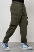Оптом Джинсы карго мужские с накладными карманами цвета хаки 2424Kh в Волгоградке, фото 7