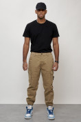 Оптом Джинсы карго мужские с накладными карманами бежевого цвета 2426B в Оренбурге, фото 9