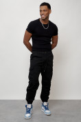 Оптом Джинсы карго мужские с накладными карманами черного цвета 2427Ch в Волгоградке, фото 11