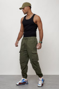 Оптом Джинсы карго мужские с накладными карманами цвета хаки 2428Kh в Уфе, фото 6