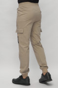 Оптом Брюки джоггеры спортивные с карманами мужские бежевого цвета 3075B в Екатеринбурге, фото 12