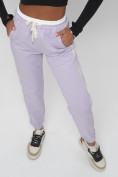 Оптом Джоггеры спортивные трикотажные женские фиолетового цвета 311F в Казани, фото 16