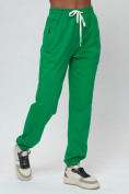 Оптом Джоггеры спортивные трикотажные женские большого размера зеленого цвета 320Z, фото 10