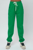 Оптом Джоггеры спортивные трикотажные женские большого размера зеленого цвета 320Z, фото 6