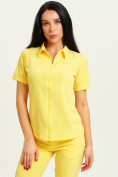Оптом Спортивная футболка поло женская желтого цвета 33412J в Екатеринбурге
