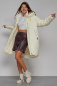 Оптом Пальто утепленное с капюшоном зимнее женское светло-желтого цвета 51128SJ, фото 12