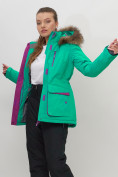 Оптом Куртка спортивная женская зимняя с мехом зеленого цвета 551777Z в Казани, фото 12