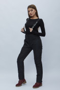 Оптом Полукомбинезон брюки горнолыжные женские черного цвета 55221Ch в Казани, фото 4
