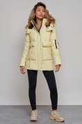 Оптом Зимняя женская куртка модная с капюшоном желтого цвета 589827J в Казани, фото 3
