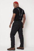 Оптом Полукомбинезон брюки горнолыжные мужские черного цвета 662123Ch в Казани, фото 4